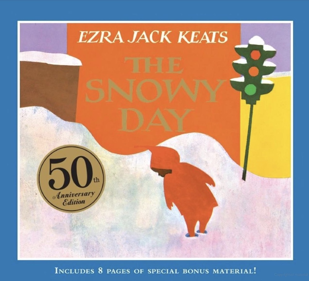 The book cover image for 'The Snowy Day' features a blue square border around an illustration of a young Black child in a red snowsuit looking down at a snowbank on the sidewalk. To their right is a traffic light. The title text is superimposed over a red rectangle building.