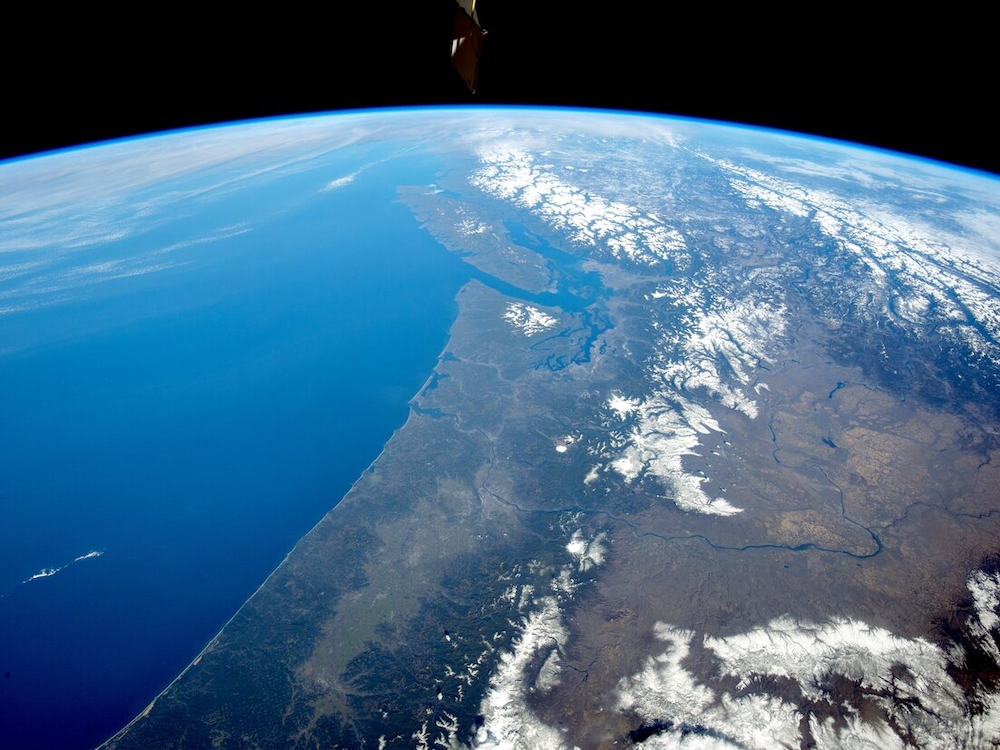 A view from space of the West Coast coastline stretching from British Columbia to Oregon.